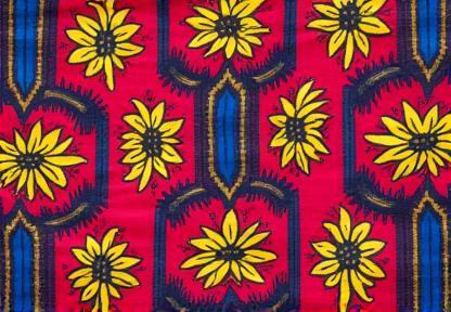 Vibrant batik fabric pattern featuring rich colors and flowing traditional designs
